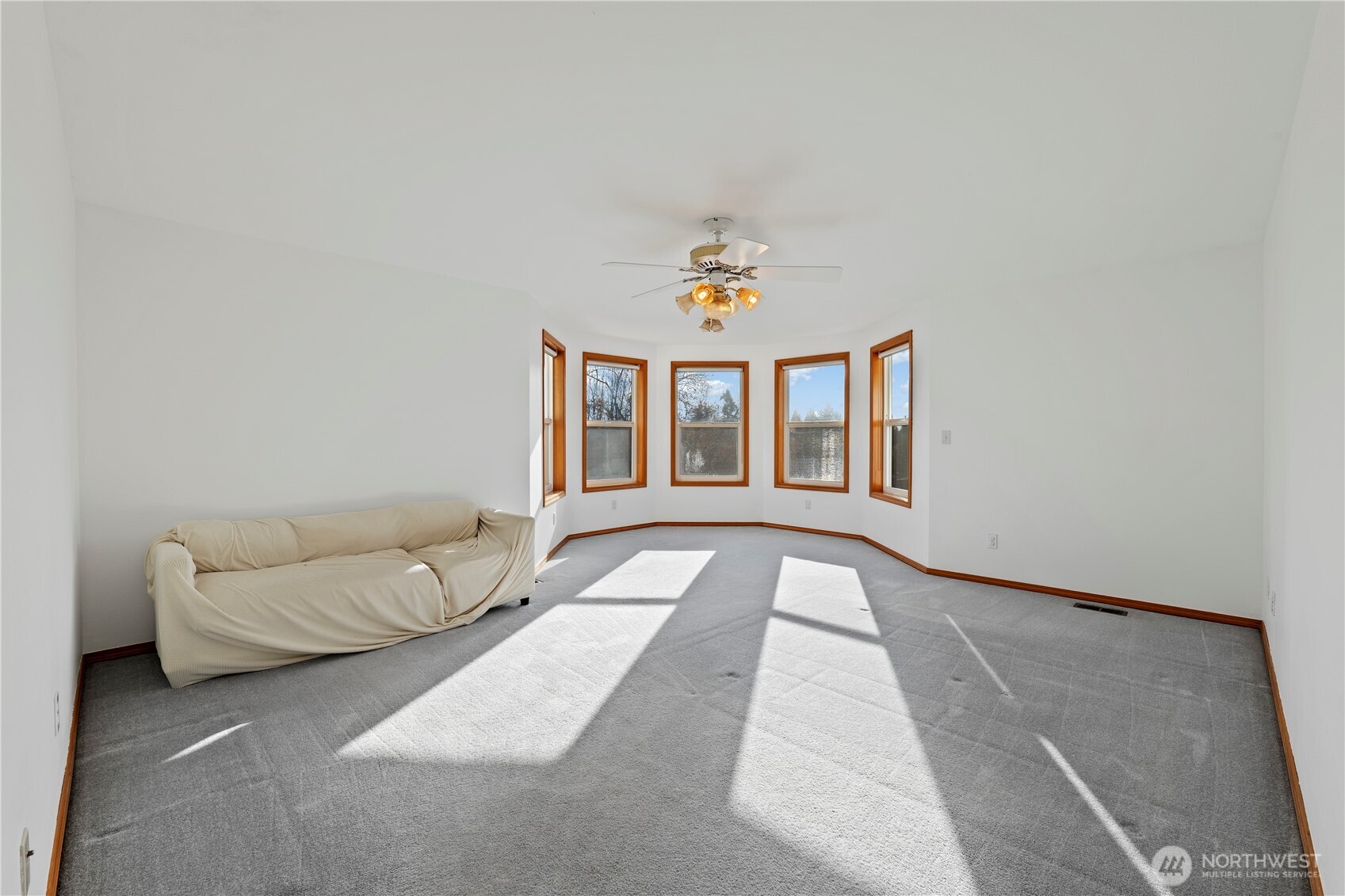 14010 282nd Lane Northeast Duvall, WA 98019 - Photo 21 of 34 a living room with furniture and a large window