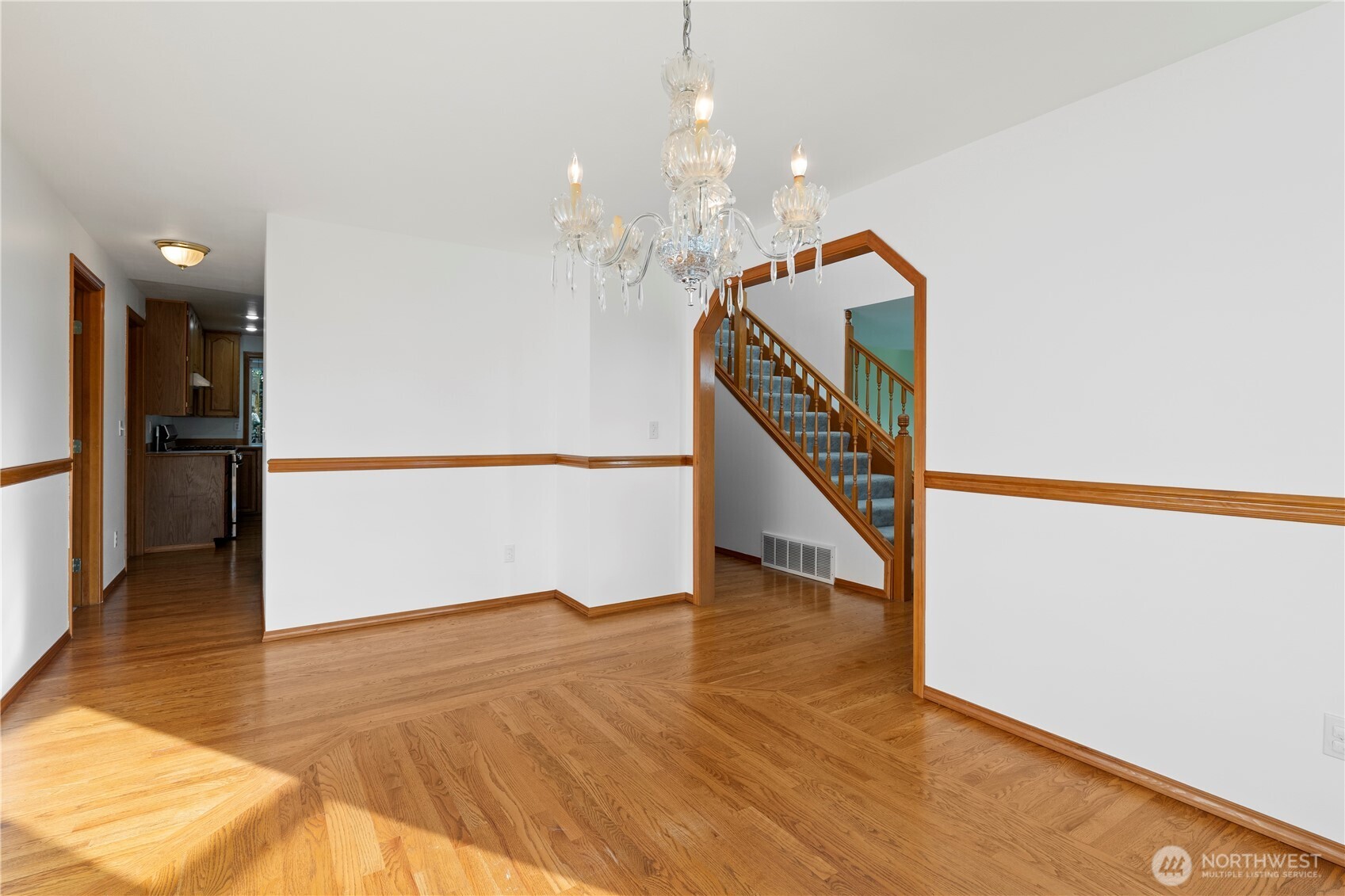 14010 282nd Lane Northeast Duvall, WA 98019 - Photo 6 of 34 a view of entryway and hall with wooden floor
