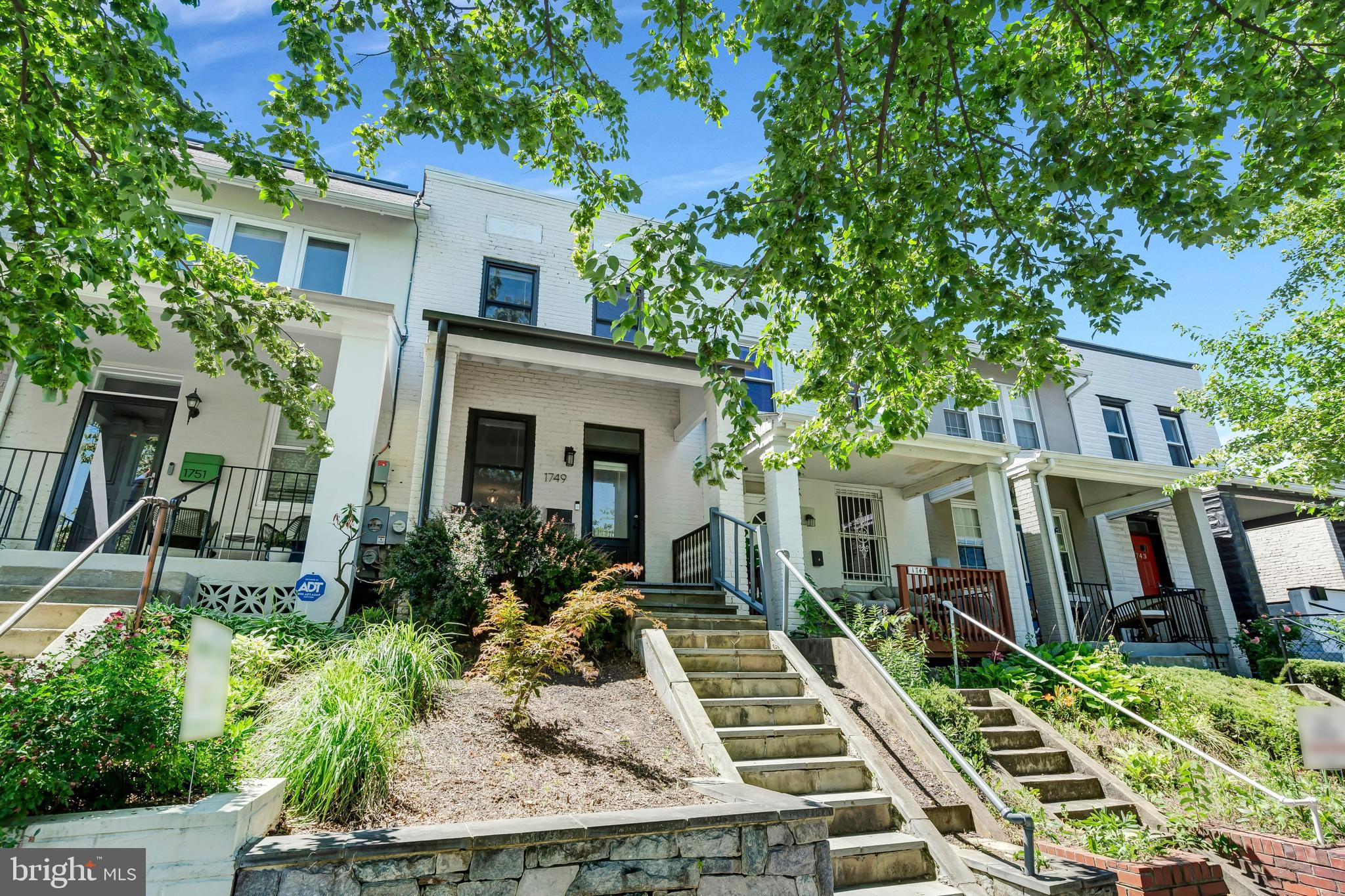 1749 L Street Northeast Washington, DC 20002 - Photo 3 of 24 front view of a house with a yard