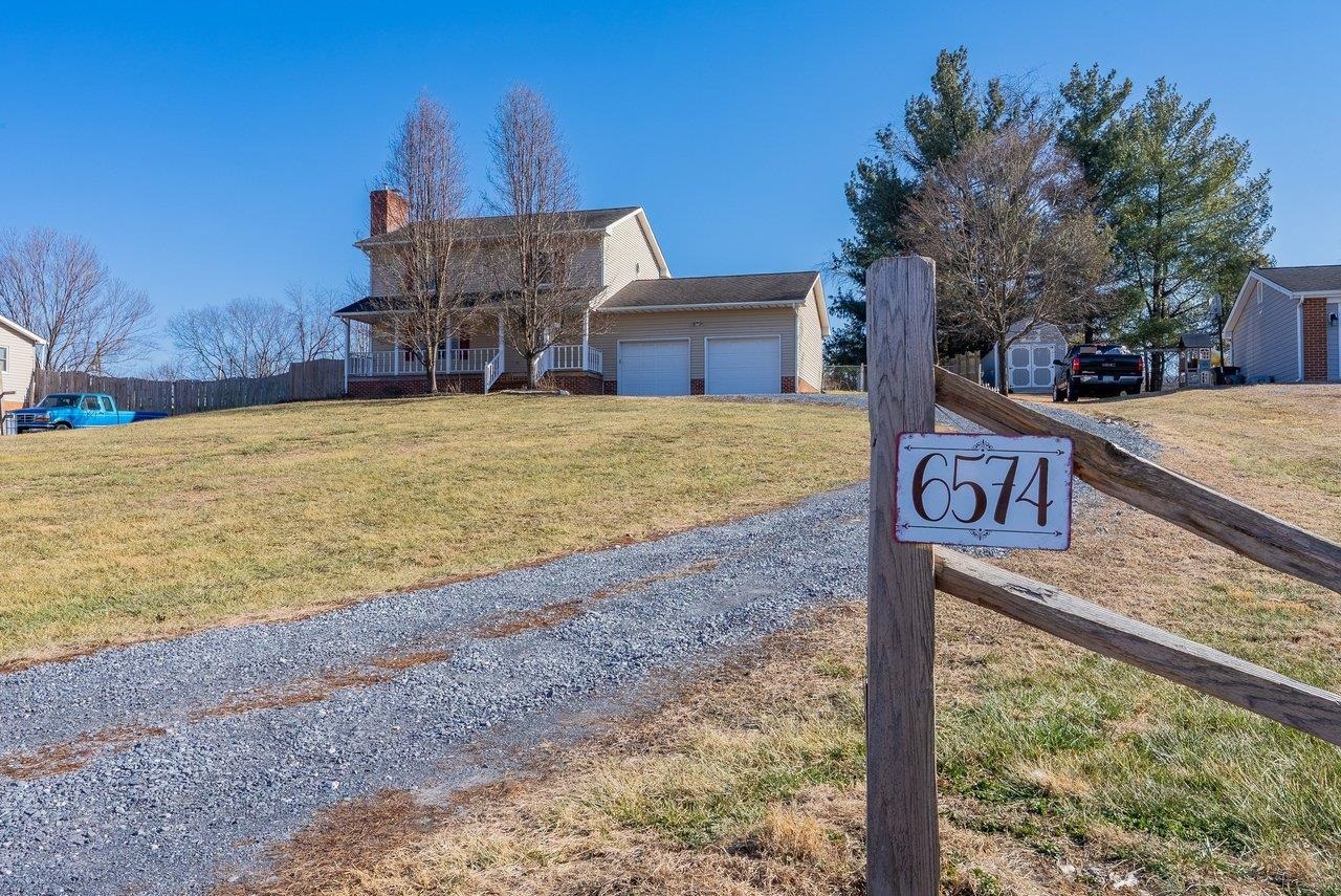 6574 Simmers Valley Road Harrisonburg, VA 22802 - Photo 2 of 55 a sign board with wooden fence