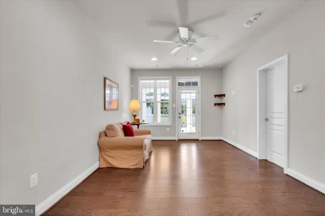 a living room with furniture and window