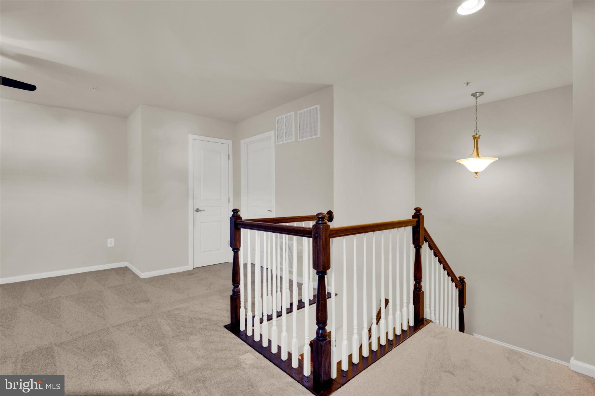 1219 Beaver Tree Drive Odenton, MD 21113 - Photo 25 of 48 a view of staircase with railing and white walls