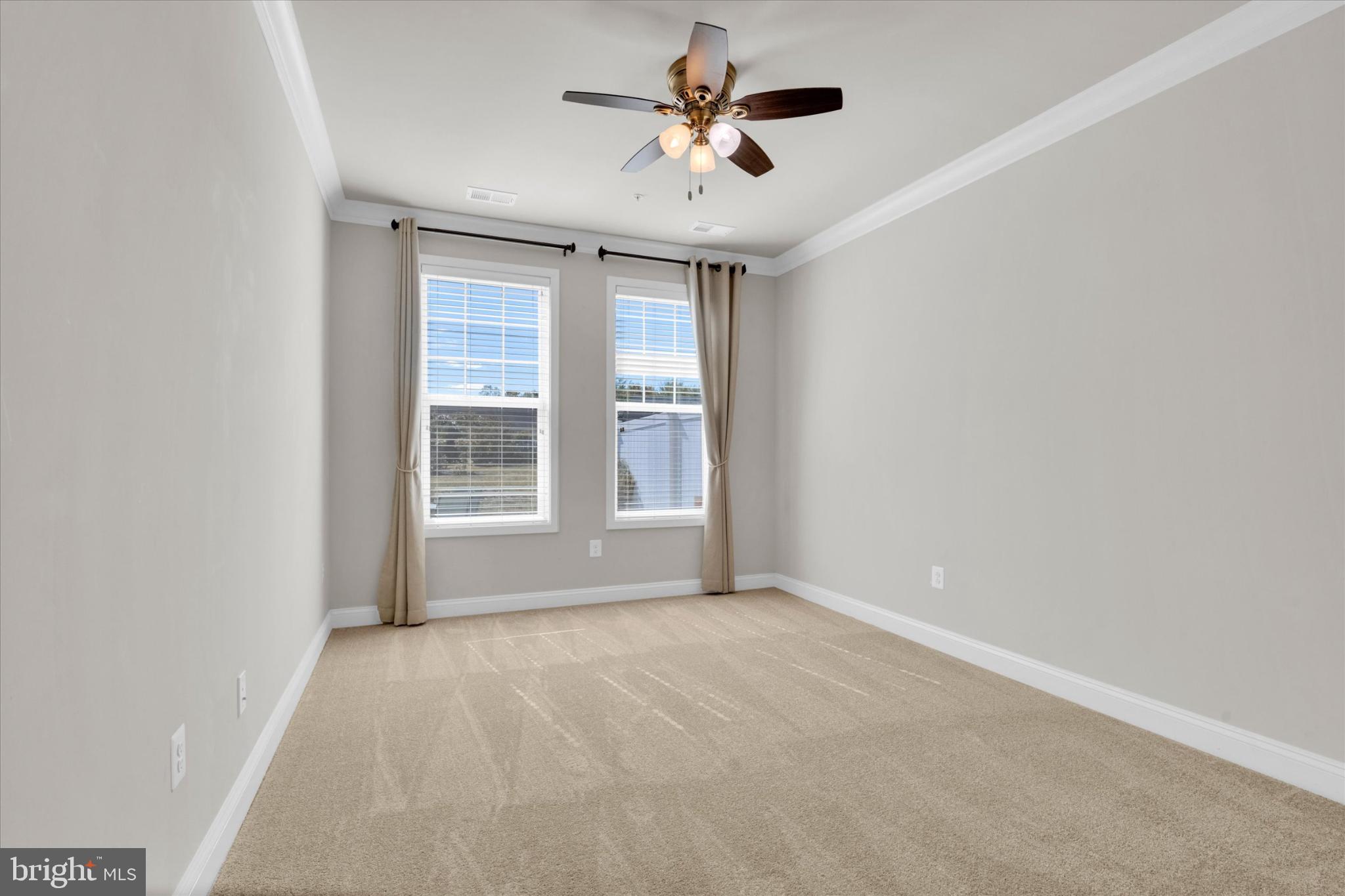 1219 Beaver Tree Drive Odenton, MD 21113 - Photo 26 of 48 a view of an empty room with a window