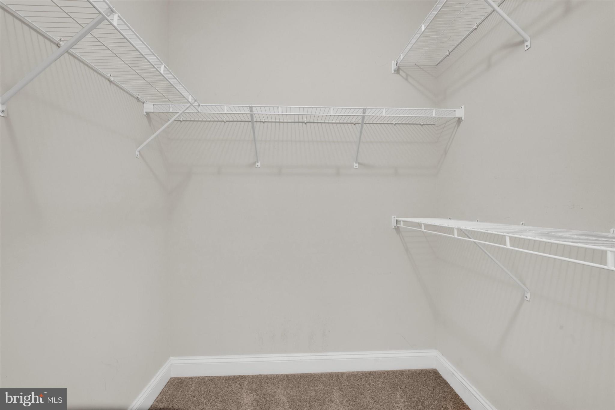 1219 Beaver Tree Drive Odenton, MD 21113 - Photo 31 of 48 a view of a room with racks on the wall