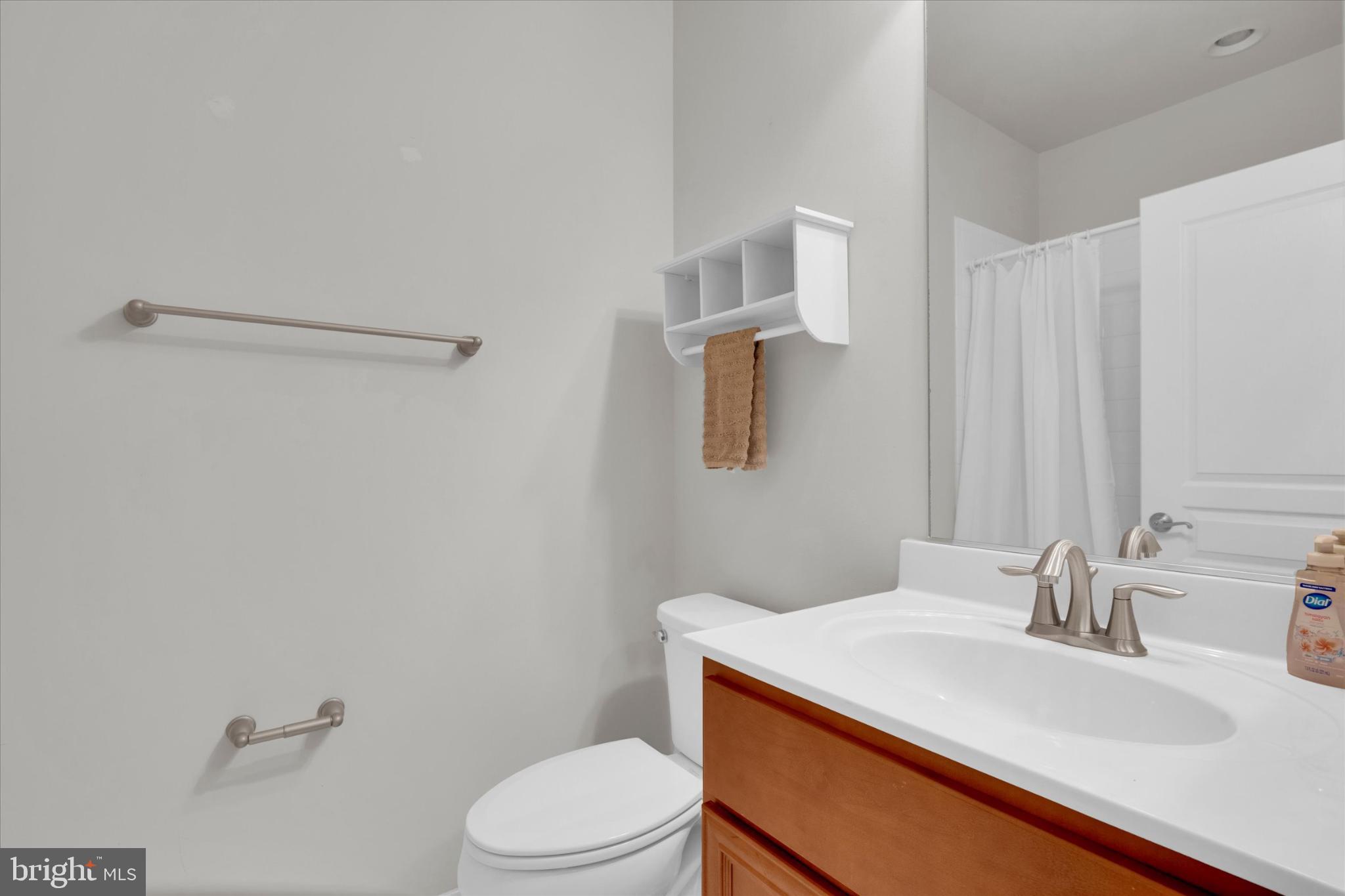 1219 Beaver Tree Drive Odenton, MD 21113 - Photo 38 of 48 a bathroom with a sink a toilet and vanity