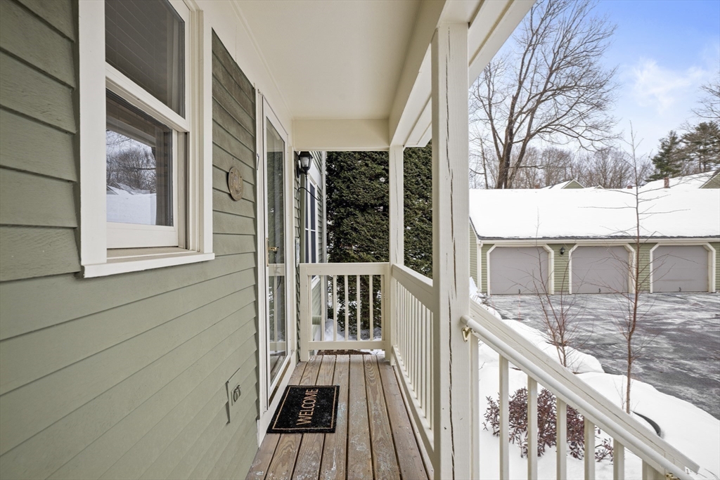 7 Fieldstone Drive, Unit 7 Upton, MA 01568 - Photo 28 of 30 a view of balcony with wooden floor
