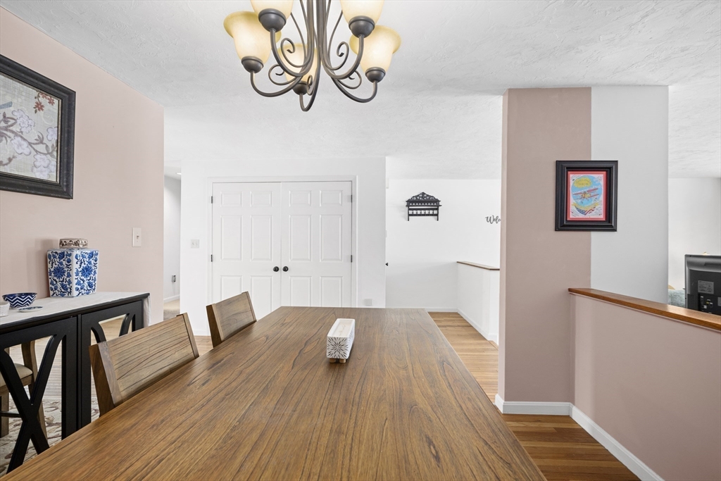 7 Fieldstone Drive, Unit 7 Upton, MA 01568 - Photo 10 of 30 a view of empty room with wooden floor