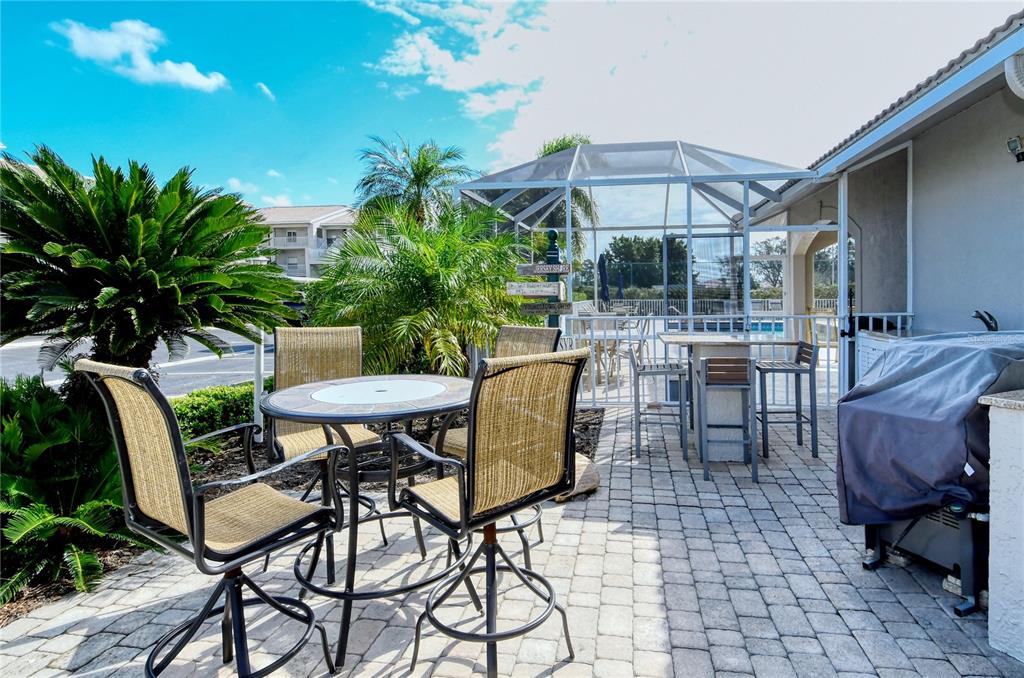 9320 Clubside Circle, Unit 2209 Sarasota, FL 34238 - Photo 16 of 27 a view of an outdoor seating area