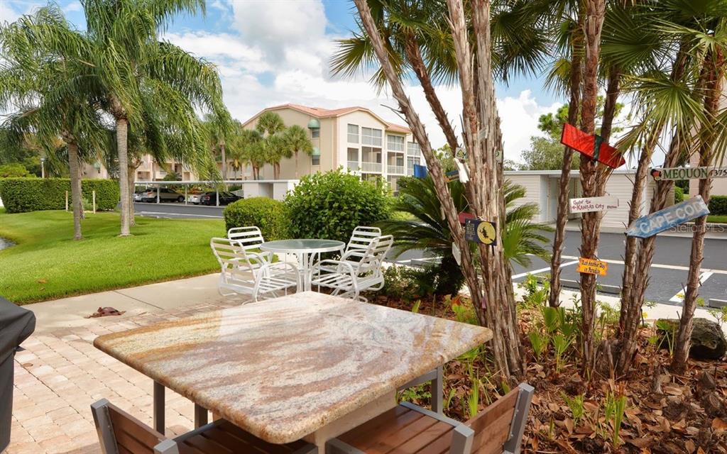9320 Clubside Circle, Unit 2209 Sarasota, FL 34238 - Photo 17 of 27 a view of outdoor space yard and patio