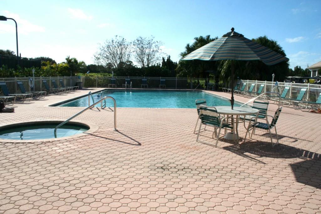 9320 Clubside Circle, Unit 2209 Sarasota, FL 34238 - Photo 25 of 27 a view of a swimming pool with a patio