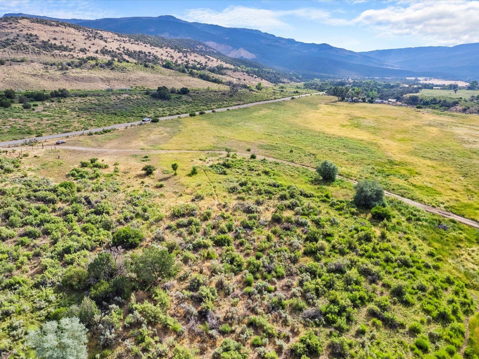 5681 Purdy Mesa Road Whitewater, CO 81527 - Photo 11 of 12 a view of an ocean and a mountain