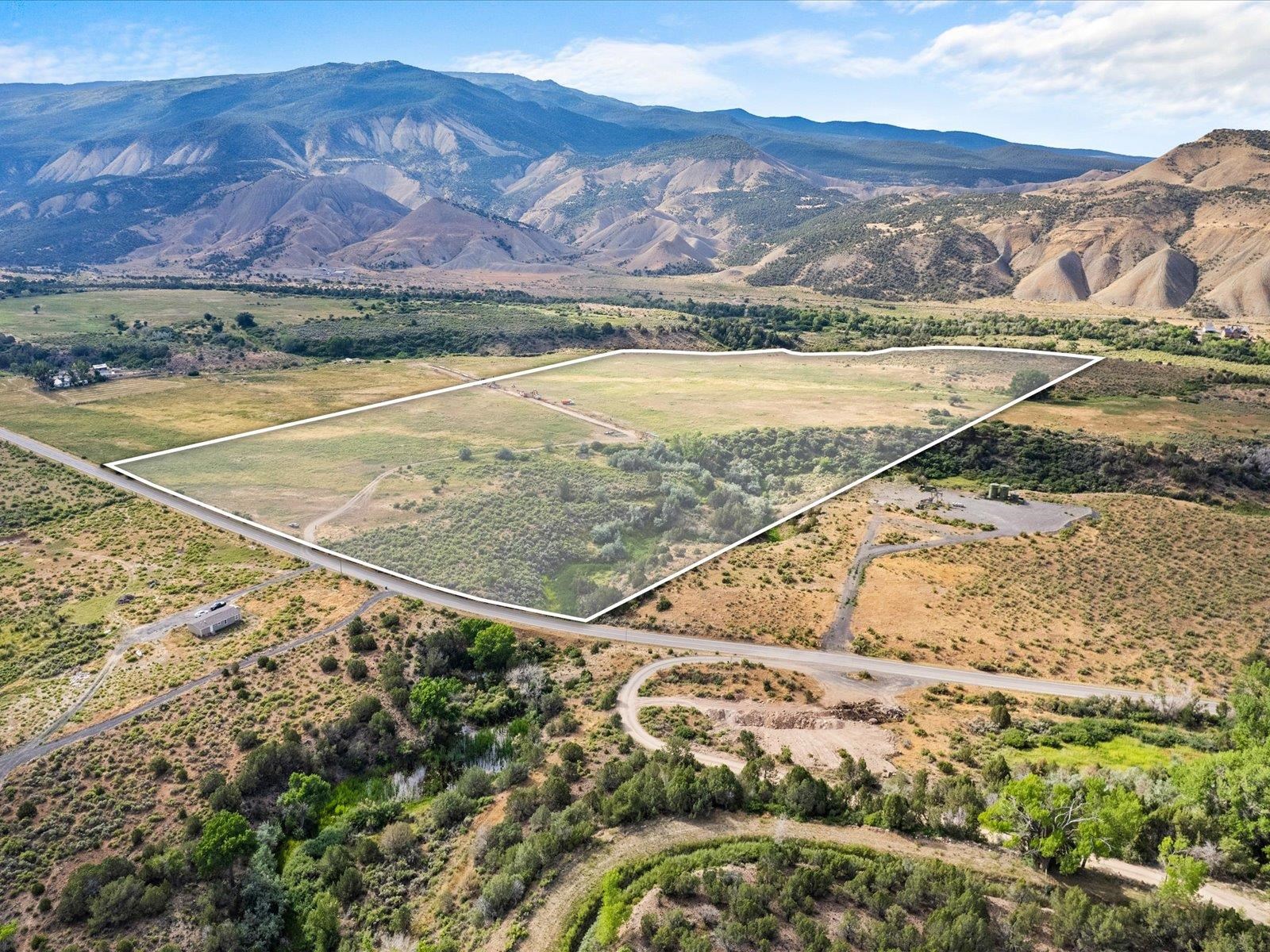 5681 Purdy Mesa Road Whitewater, CO 81527 - Photo 3 of 12 a view of an outdoor space and mountain view