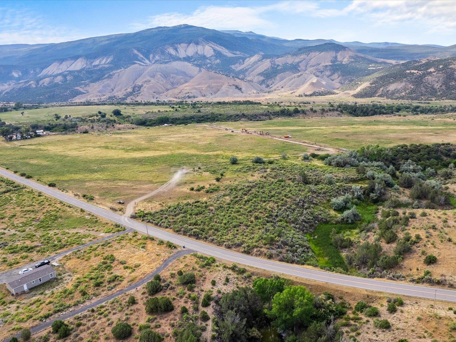 5681 Purdy Mesa Road Whitewater, CO 81527 - Photo 5 of 12 a view of an ocean and a mountain