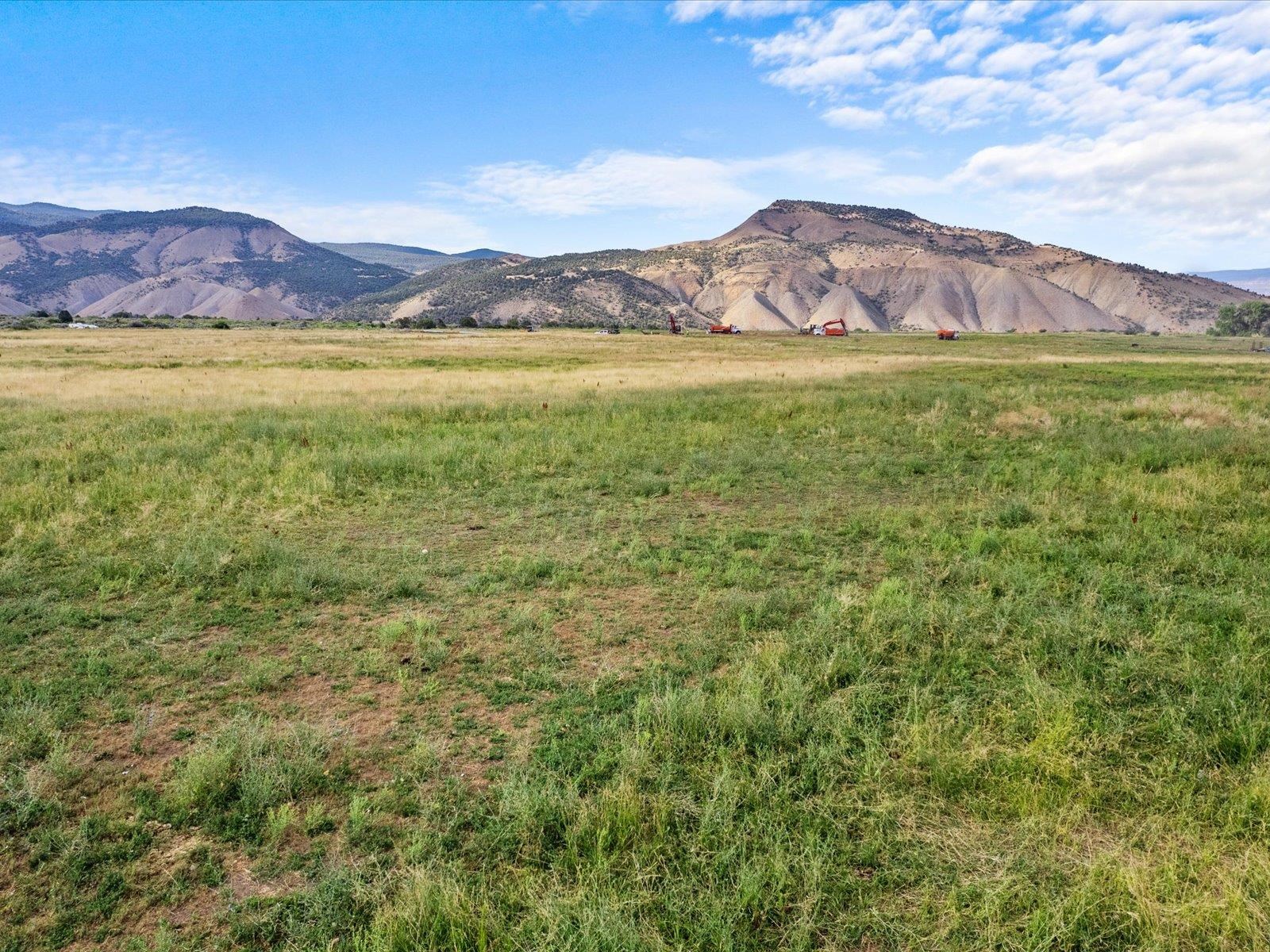 5681 Purdy Mesa Road Whitewater, CO 81527 - Photo 8 of 12 a view of an ocean and a mountain