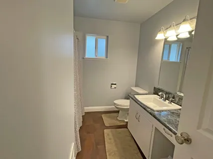 a bathroom with a sink and a vanity