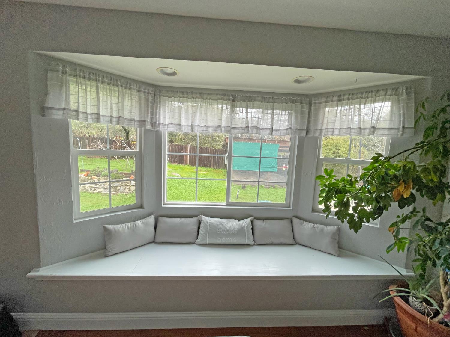 768 Excelsior Road Placerville, CA 95667 - Photo 8 of 17 a view of wooden floor and windows in a room