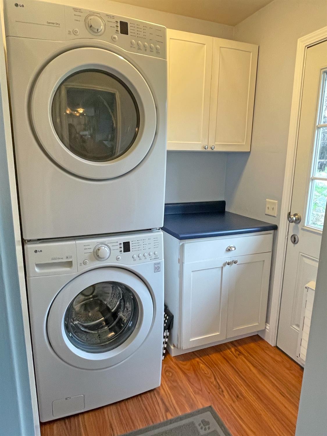 768 Excelsior Road Placerville, CA 95667 - Photo 10 of 17 a utility room with washing machine and a view of bedroom