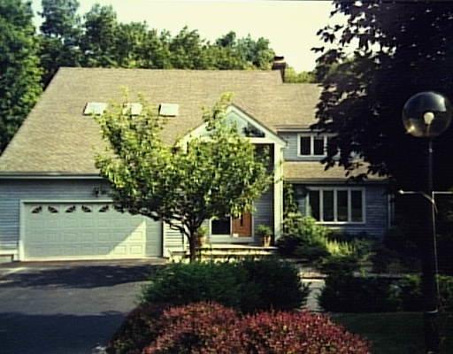 21 Harborview Road Westport, CT 06880 - Photo 1 of 1 an aerial view of a house with garden space and lake view
