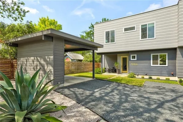 a view of a house with a swimming pool