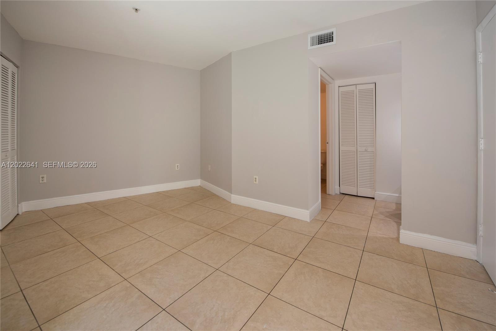 4147 Stirling Road, Unit 105 Dania Beach, FL 33314 - Photo 12 of 16 a view of an empty room and entryway