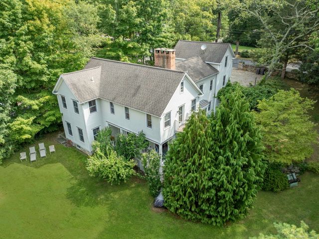 an aerial view of a house with a garden