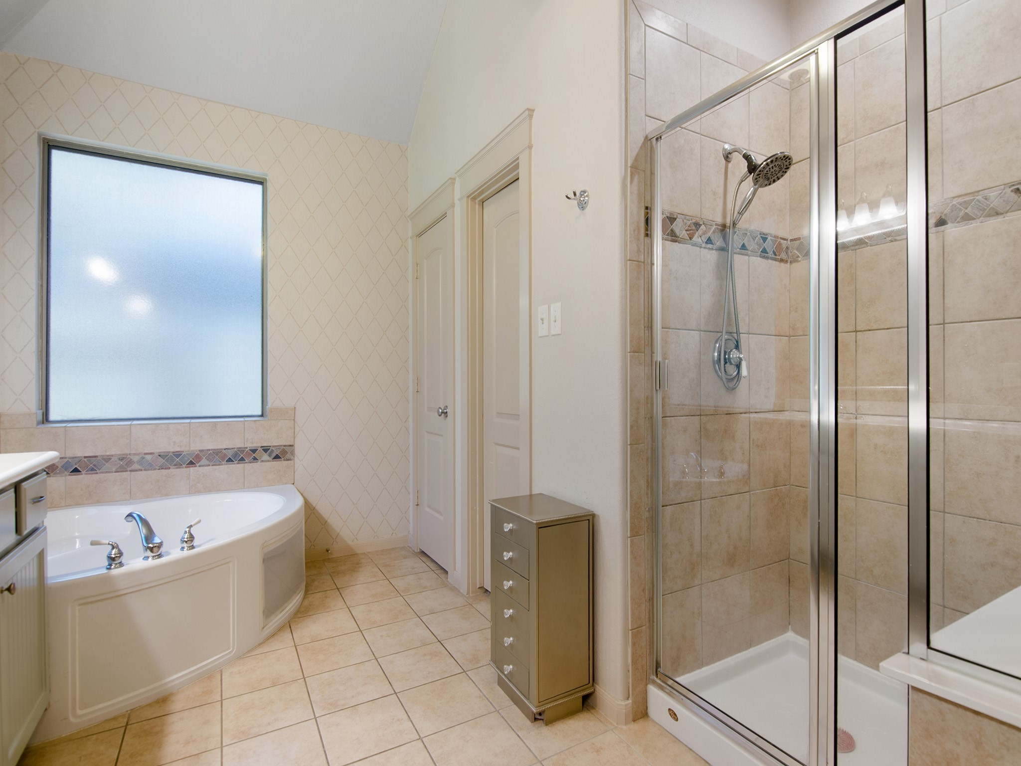 28323 Ryans Ridge Lane Spring, TX 77386 - Photo 21 of 45 Primary bath features a walk-in shower, private commode room and large walk-in closet.