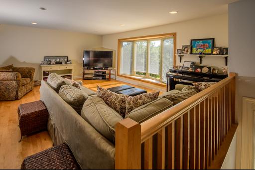 230 North Ela Road Barrington, IL 60010 - Photo 6 of 16 a living room with furniture and a flat screen tv