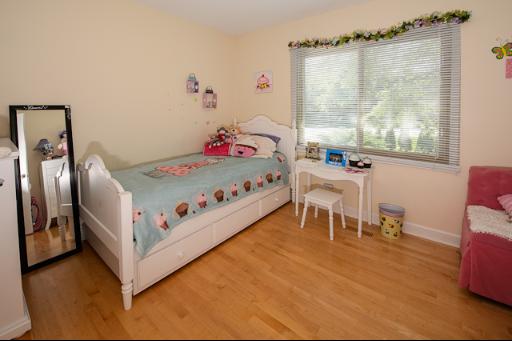 230 North Ela Road Barrington, IL 60010 - Photo 9 of 16 a bedroom with a bed and a table