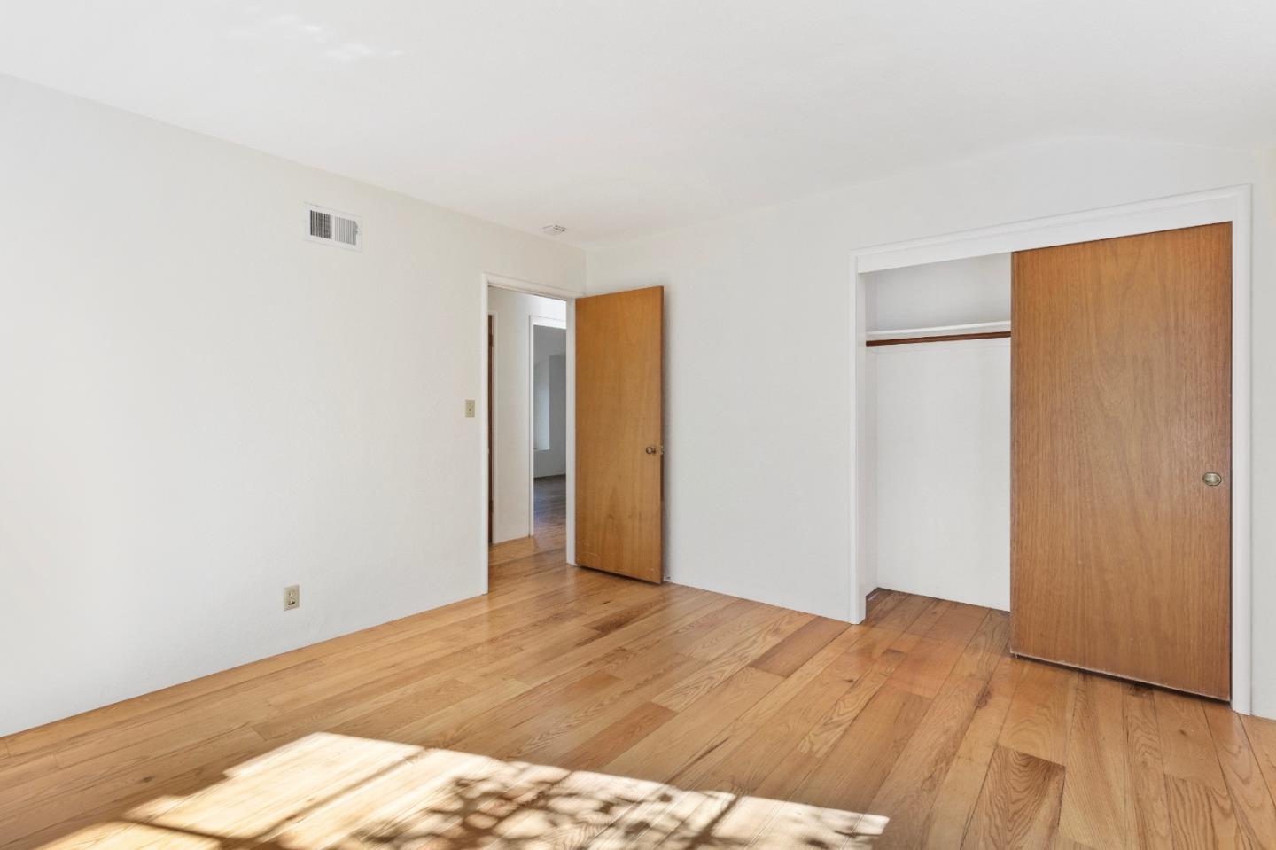 179 Eunice Avenue Mountain View, CA 94040 - Photo 15 of 23 a view of a room with wooden floor and closet