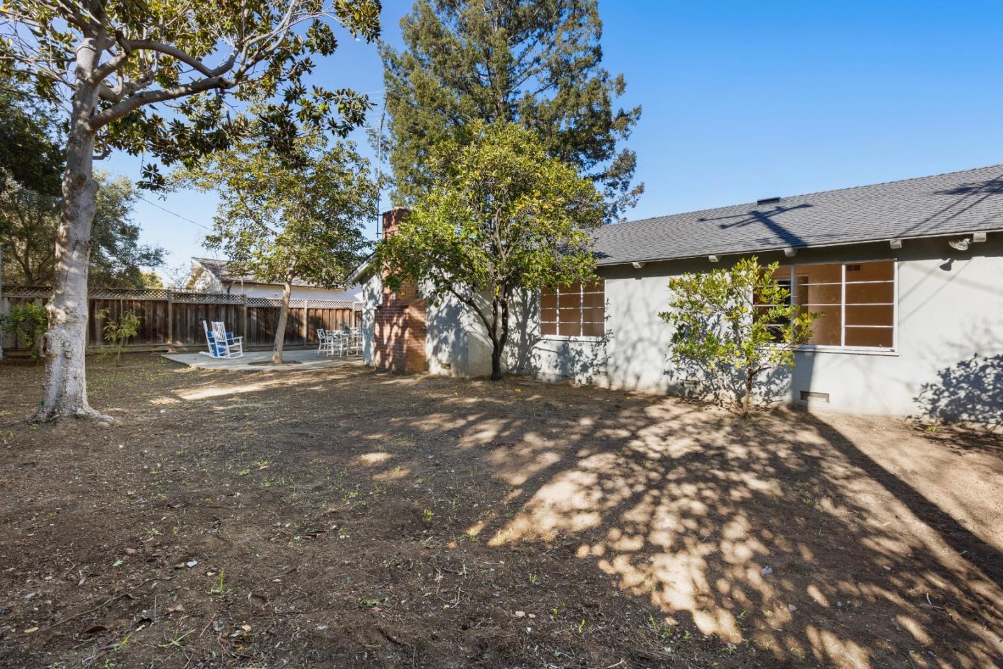 179 Eunice Avenue Mountain View, CA 94040 - Photo 16 of 23 a front view of a house with a garden