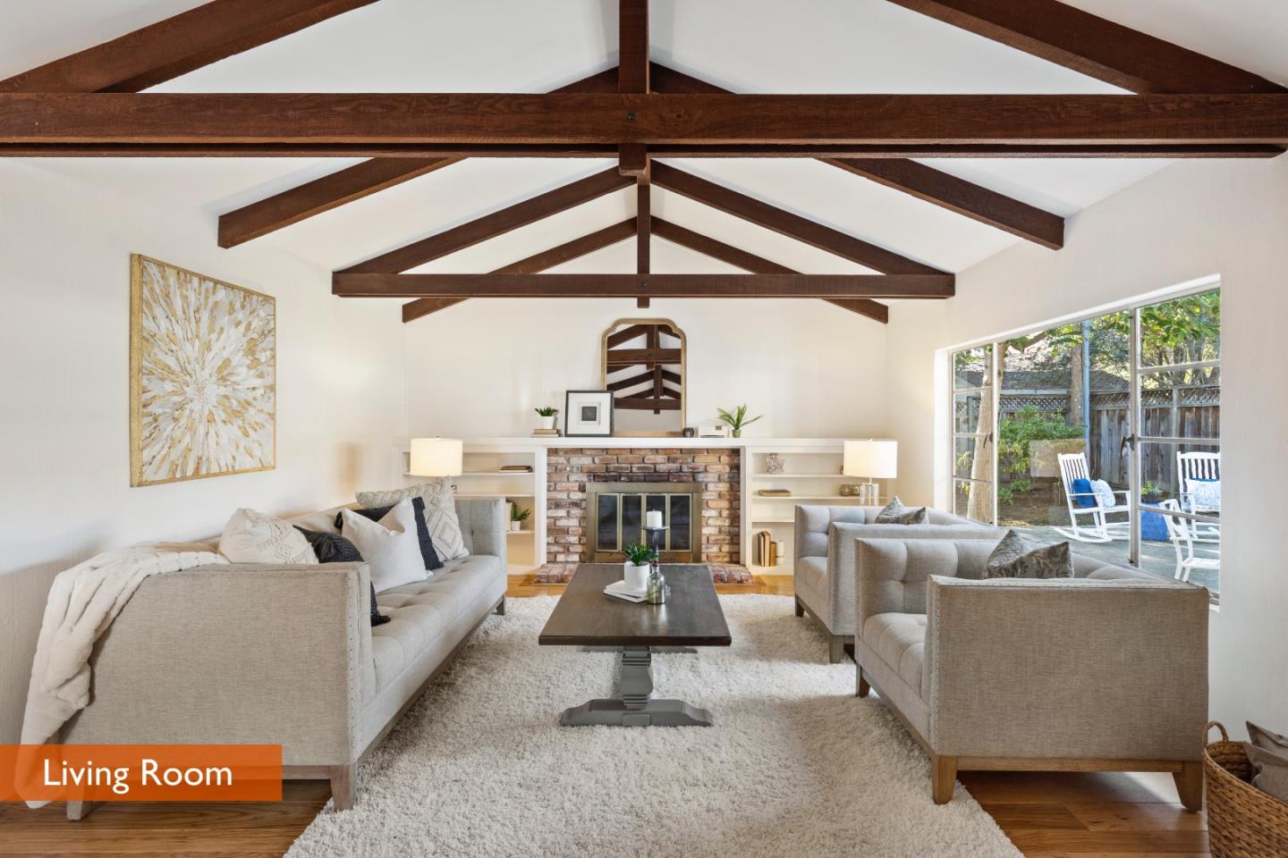 179 Eunice Avenue Mountain View, CA 94040 - Photo 2 of 23 a living room with furniture a chandelier and a fireplace