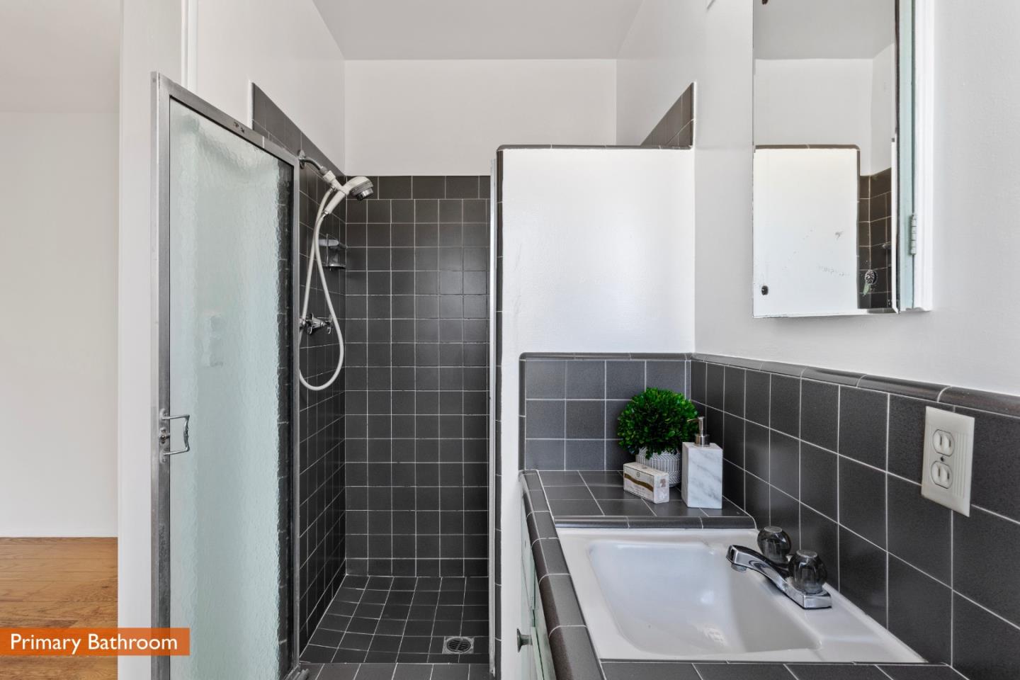 179 Eunice Avenue Mountain View, CA 94040 - Photo 9 of 23 a bathroom with a sink and a shower