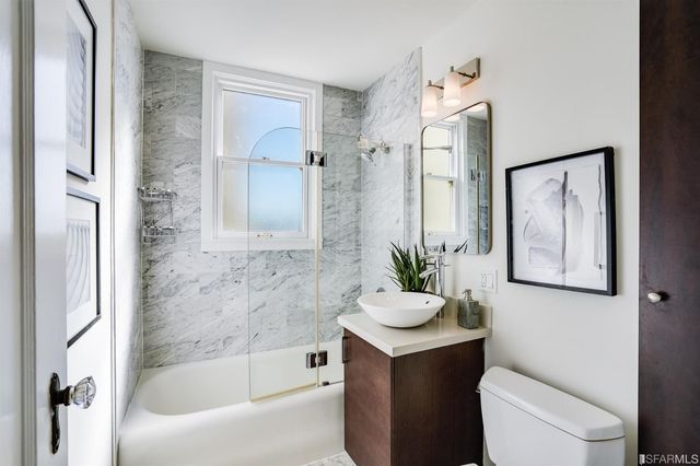 a view of a bedroom from a hallway