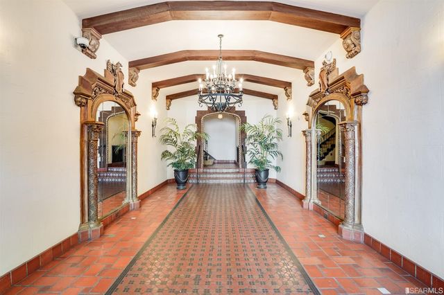 a city street lined with buildings and cars