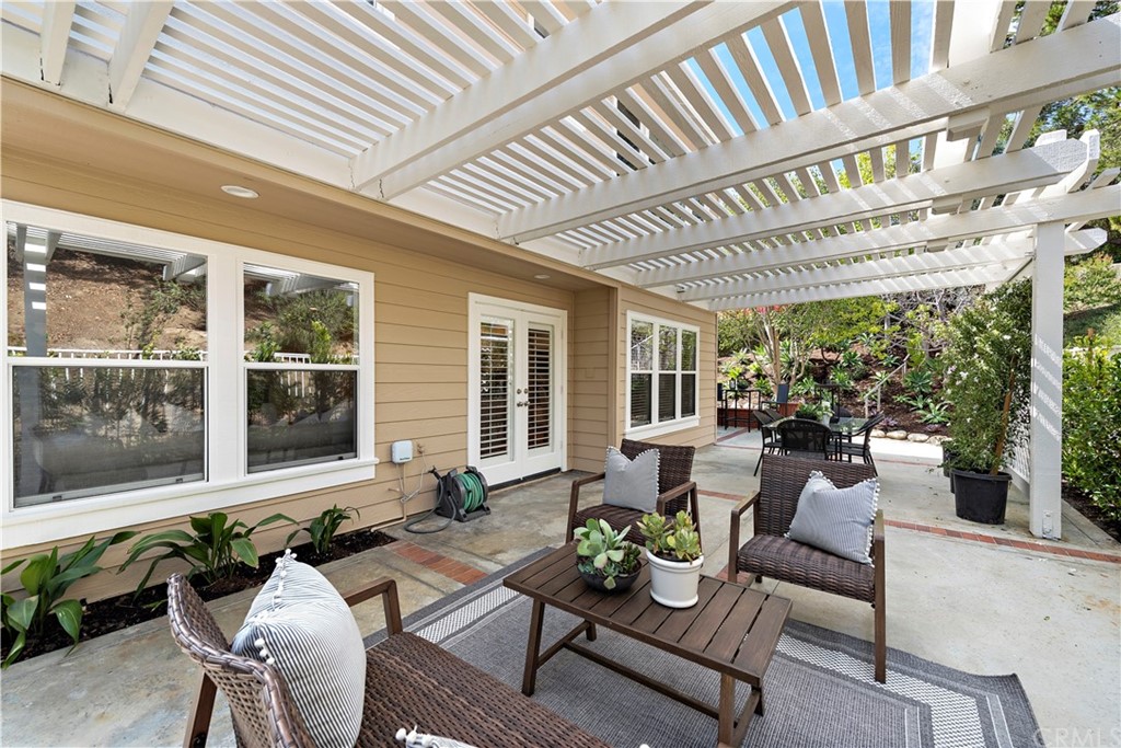 2 Tidemark Laguna Niguel, CA 92677 - Photo 17 of 57 a outdoor living space with furniture and garden view