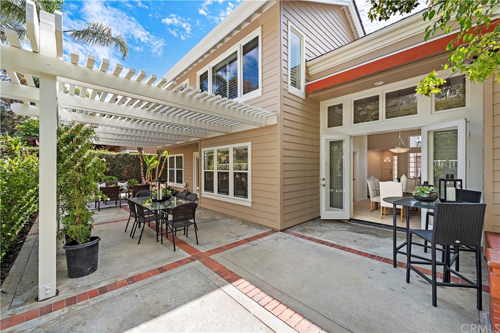 2 Tidemark Laguna Niguel, CA 92677 - Photo 20 of 57 a patio with glass top table and chairs