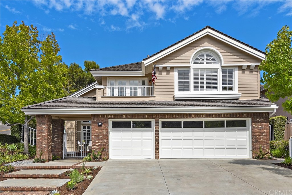 2 Tidemark Laguna Niguel, CA 92677 - Photo 23 of 57 a front view of a house with a yard
