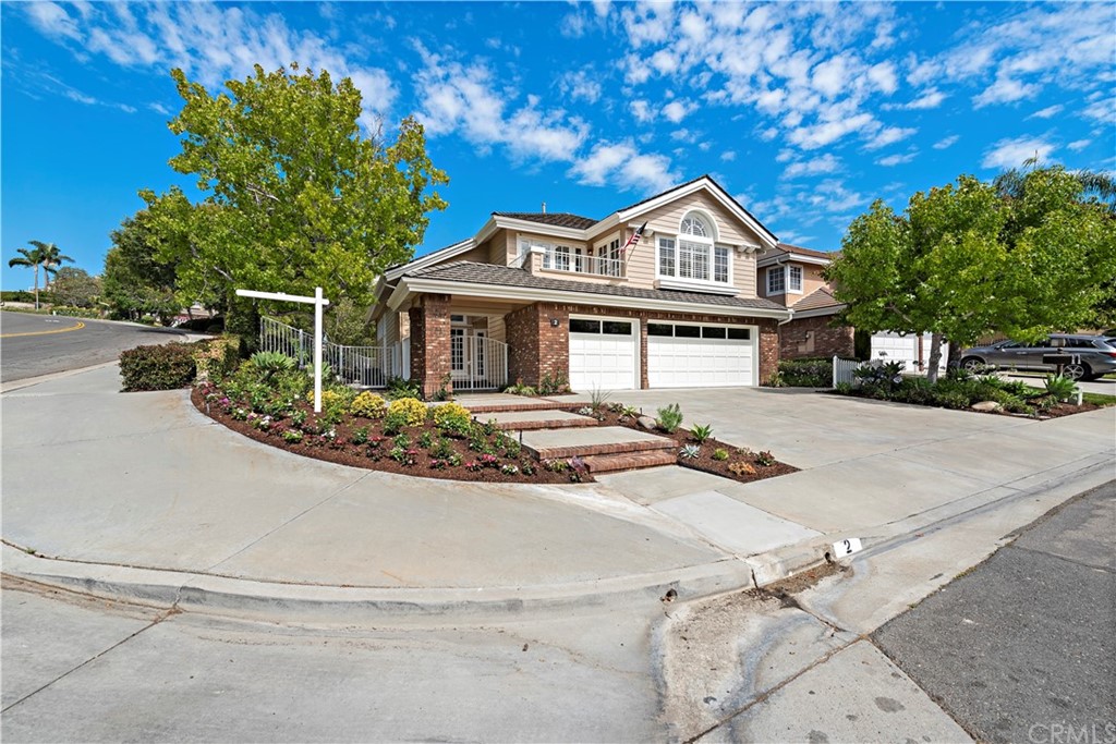 2 Tidemark Laguna Niguel, CA 92677 - Photo 25 of 57 a front view of a house with yard porch and tree