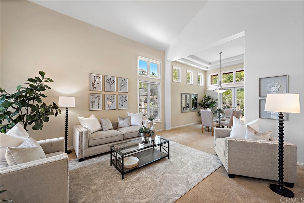 2 Tidemark Laguna Niguel, CA 92677 - Photo 3 of 57 a living room with furniture and a potted plant