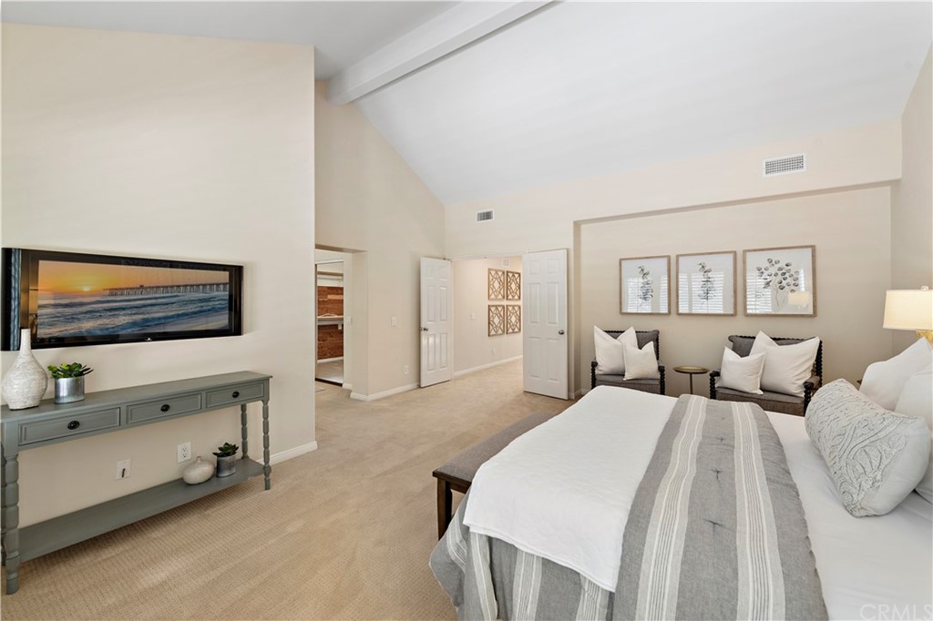 2 Tidemark Laguna Niguel, CA 92677 - Photo 31 of 57 a bedroom with a bed and a flat screen tv