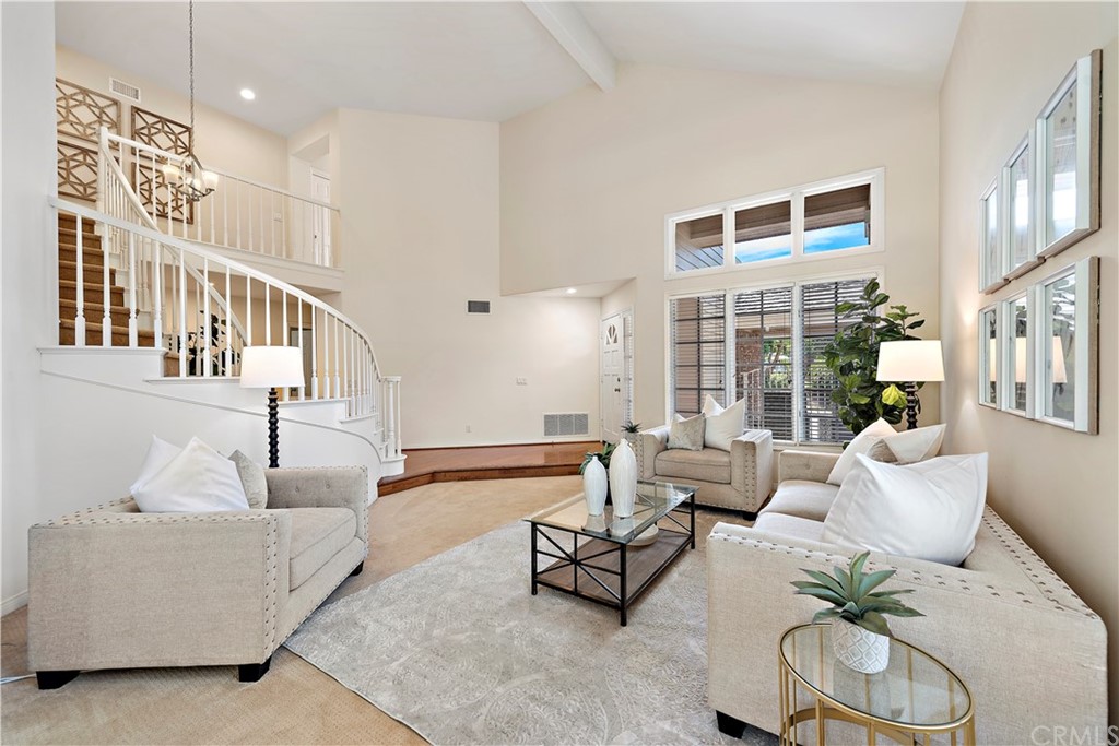 2 Tidemark Laguna Niguel, CA 92677 - Photo 4 of 57 a living room with furniture and a floor to ceiling window