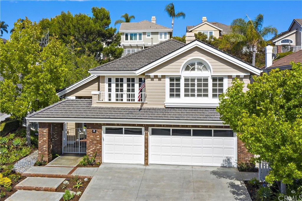 2 Tidemark Laguna Niguel, CA 92677 - Photo 44 of 57 a front view of a house with a yard