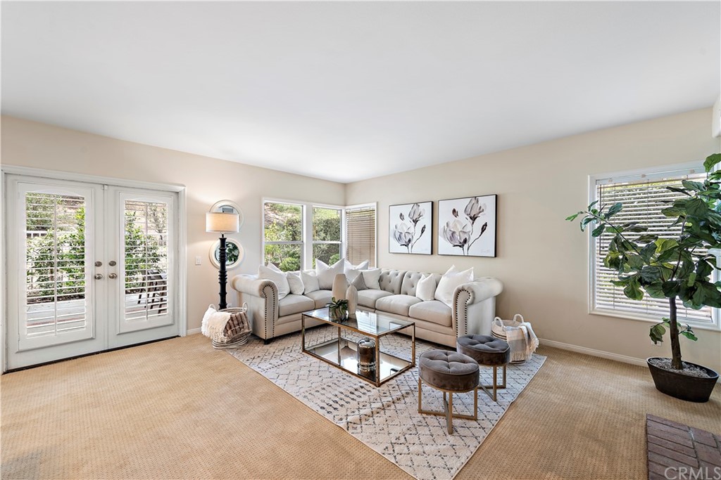 2 Tidemark Laguna Niguel, CA 92677 - Photo 6 of 57 a living room with furniture and a flat screen tv