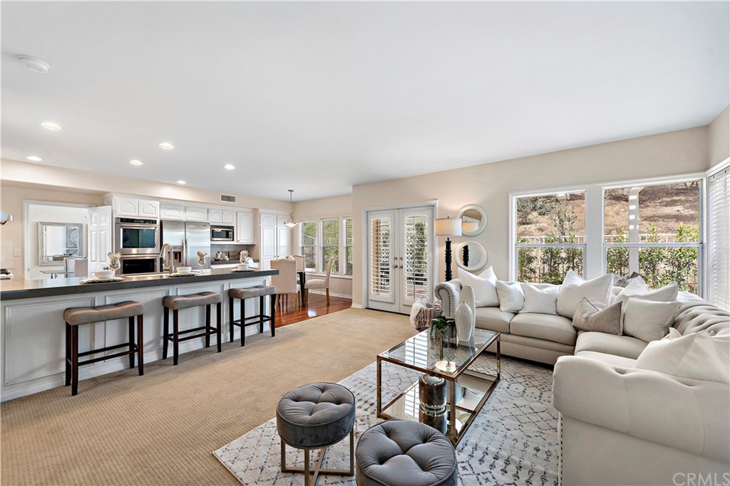 2 Tidemark Laguna Niguel, CA 92677 - Photo 7 of 57 a living room with furniture kitchen view and a large window
