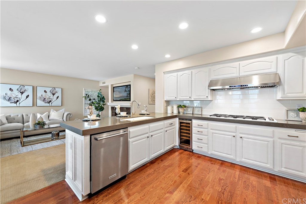 2 Tidemark Laguna Niguel, CA 92677 - Photo 10 of 57 a kitchen with stainless steel appliances granite countertop a sink and cabinets