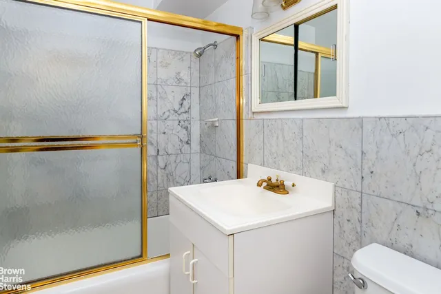 a kitchen with a stove and a cabinets