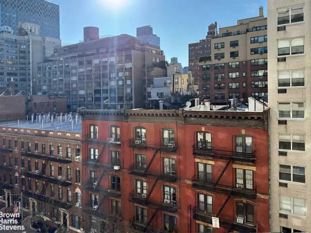 a bathroom with a sink a toilet and a bathtub