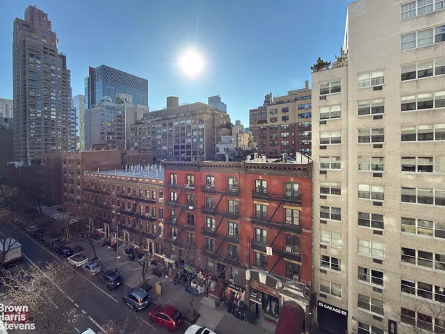 a view of a city with tall buildings