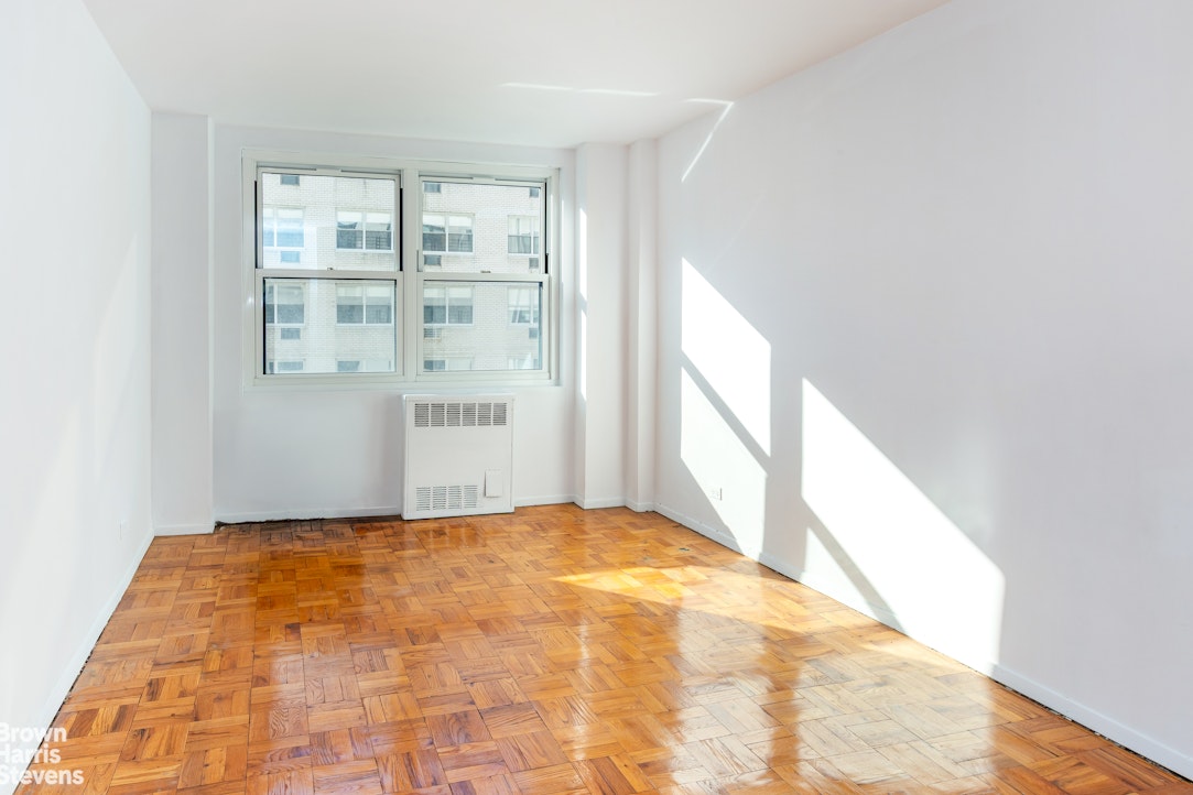 315 East 70th Street, Unit 8G Manhattan, NY 10021 - Photo 9 of 16 a view of an empty room