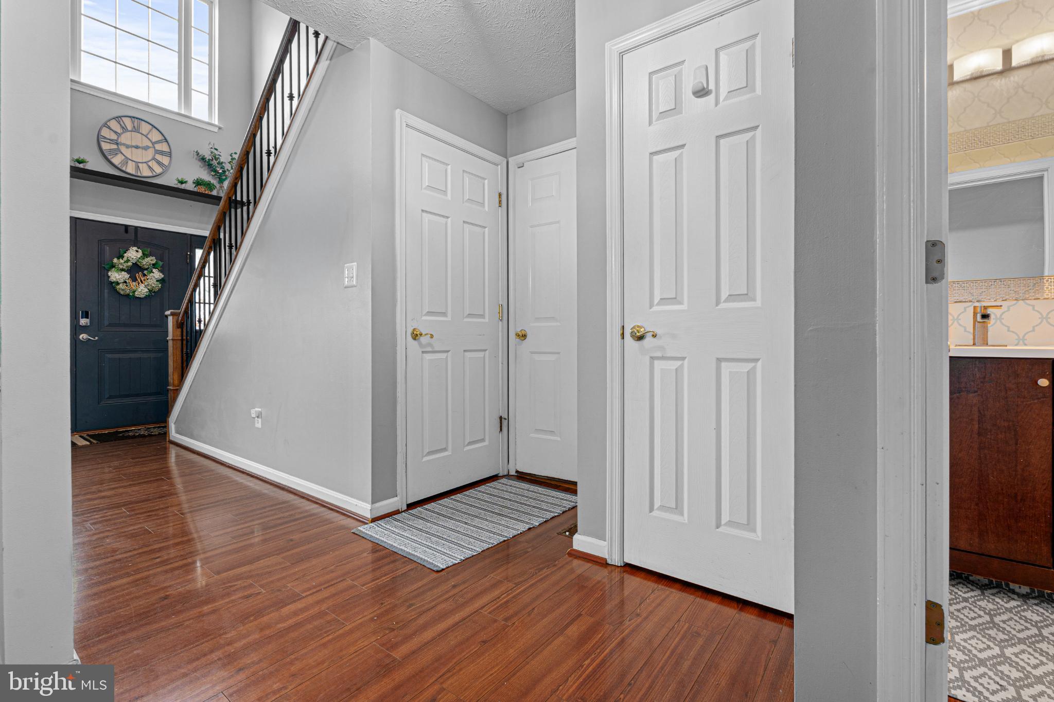 4635 Greencove Circle Sparrows Point, MD 21219 - Photo 13 of 48 a view of a hallway with wooden floor